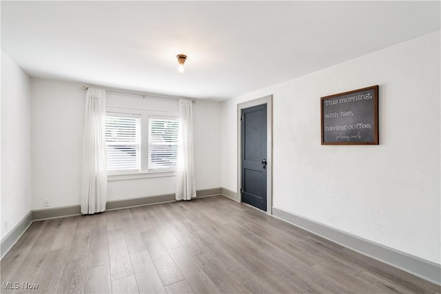 990 Franklin Ave, Salem, OH 44460 - unfurnished room with wood finished floors and baseboards