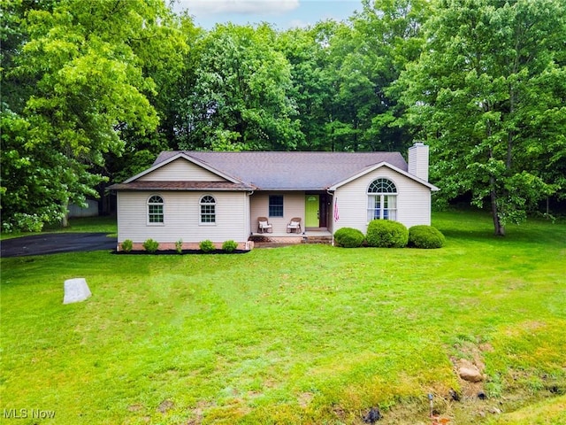 51406 Cornerstone Dr, Petersburg, OH 44454 - ranch-style house featuring a front yard, a chimney, and a porch