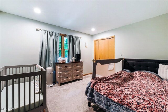 51406 Cornerstone Dr, Petersburg, OH 44454 - bedroom with light colored carpet, recessed lighting, and baseboards