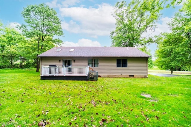 51406 Cornerstone Dr, Petersburg, OH 44454 - back of property with a wooden deck and a lawn