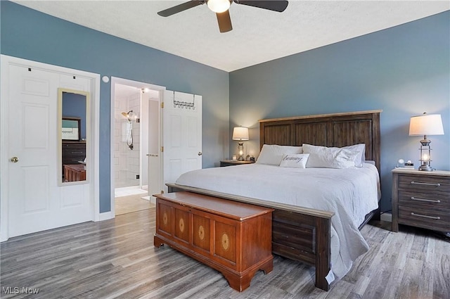 269 Brookledge Ln, Copley, OH 44321 - bedroom featuring wood finished floors, ceiling fan, and connected bathroom