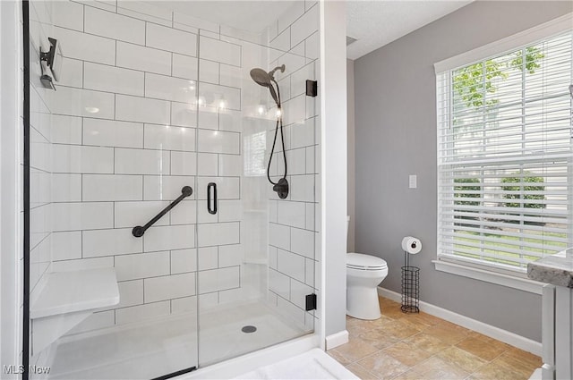 269 Brookledge Ln, Copley, OH 44321 - full bath with a shower stall, toilet, and baseboards