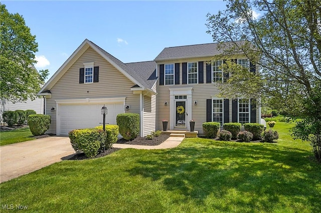 269 Brookledge Ln, Copley, OH 44321 - colonial home with concrete driveway and a front lawn