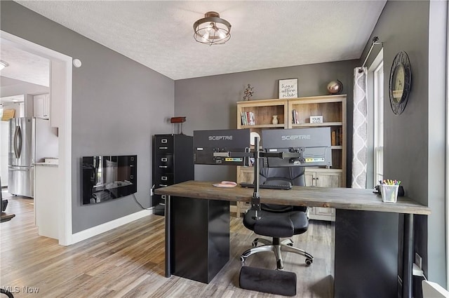 269 Brookledge Ln, Copley, OH 44321 - office space featuring wood finished floors, a textured ceiling, and baseboards