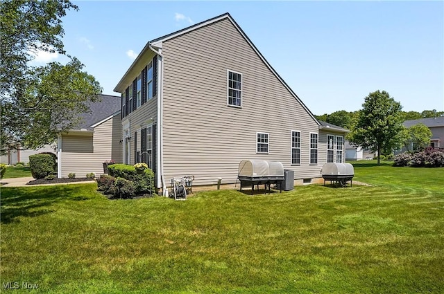 269 Brookledge Ln, Copley, OH 44321 - rear view of house featuring a yard