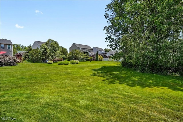 269 Brookledge Ln, Copley, OH 44321 - view of green lawn with a residential view