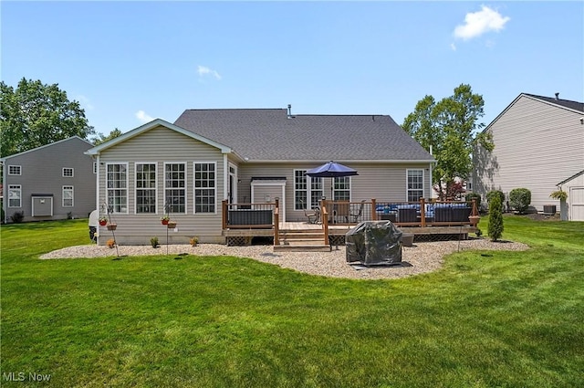 269 Brookledge Ln, Copley, OH 44321 - rear view of house with a deck and a lawn
