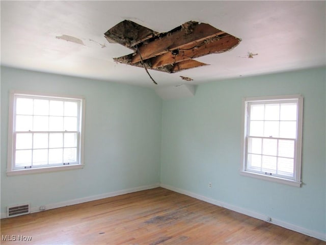 3659 Riedham Rd, Shaker Heights, OH 44120 - spare room with plenty of natural light, wood finished floors, and baseboards