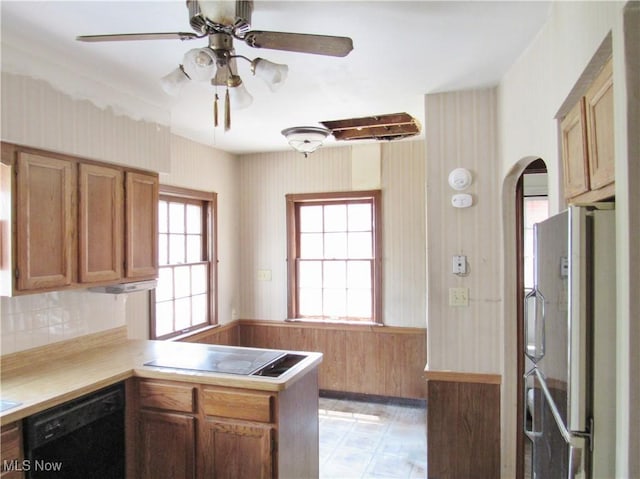 3659 Riedham Rd, Shaker Heights, OH 44120 - kitchen with black appliances, arched walkways, light countertops, a peninsula, and ceiling fan