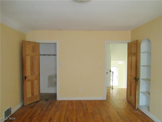 3659 Riedham Rd, Shaker Heights, OH 44120 - unfurnished bedroom featuring wood finished floors, baseboards, and a closet