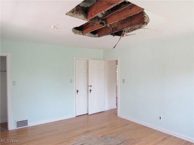 3659 Riedham Rd, Shaker Heights, OH 44120 - spare room featuring wood finished floors and baseboards