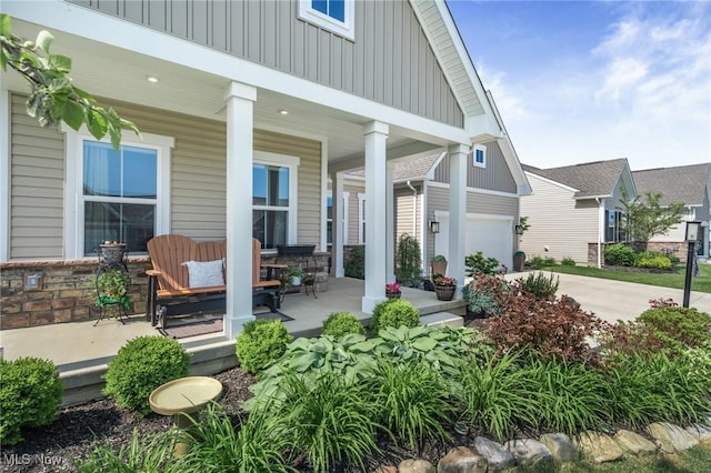 34655 N Legends Way, Grafton, OH 44044 - porch with a garage and concrete driveway