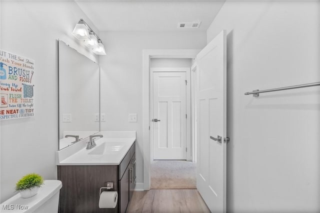 34655 N Legends Way, Grafton, OH 44044 - half bath with vanity and wood finished floors