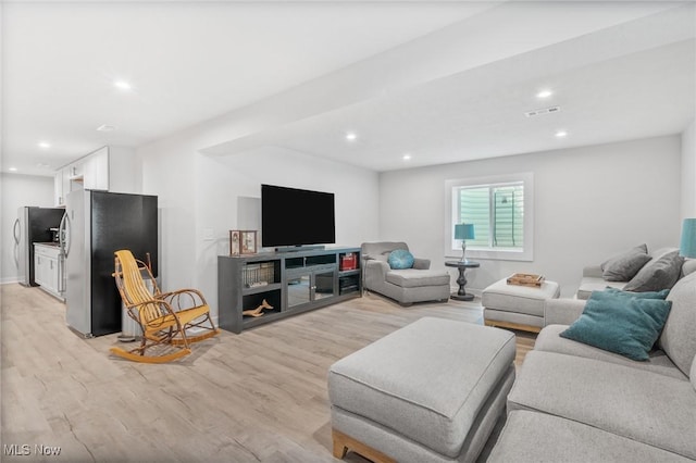 34655 N Legends Way, Grafton, OH 44044 - living room with light wood-type flooring and recessed lighting