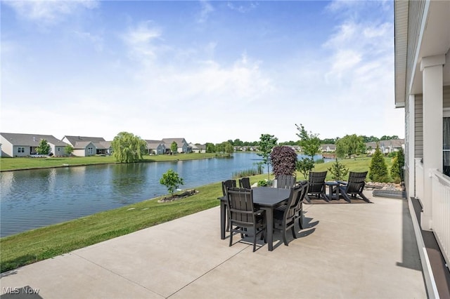 34655 N Legends Way, Grafton, OH 44044 - view of patio / terrace with outdoor dining area, a water view, and a residential view