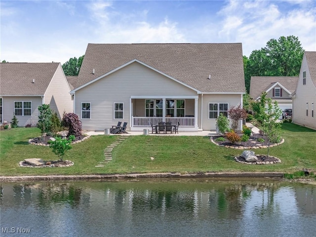 34655 N Legends Way, Grafton, OH 44044 - back of house with a patio, a water view, and a yard