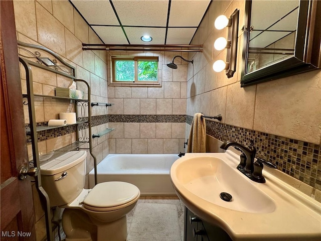 102 Wylie Dr, Short Creek, WV 26058 - full bath with tile walls,  shower combination, toilet, vanity, and backsplash