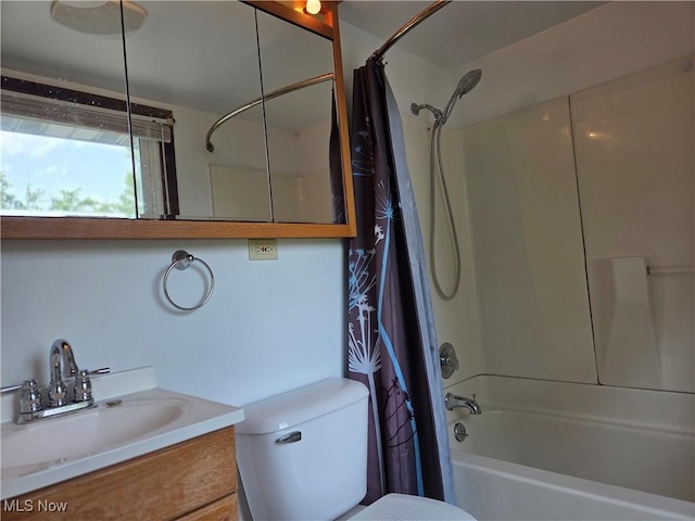 1025 S Ridge Rd, Geneva, OH 44041 - bathroom featuring toilet, shower / tub combo with curtain, and vanity