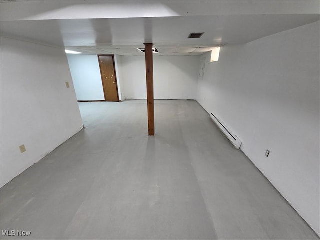 1025 S Ridge Rd, Geneva, OH 44041 - finished below grade area featuring a baseboard heating unit