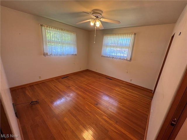 158 Main St, Rayland, OH 43943 - unfurnished room featuring wood-type flooring, a ceiling fan, and baseboards