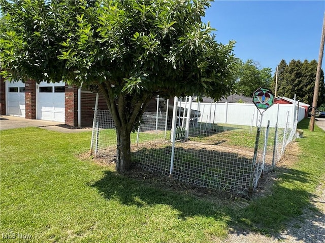 158 Main St, Rayland, OH 43943 - view of yard featuring a detached garage