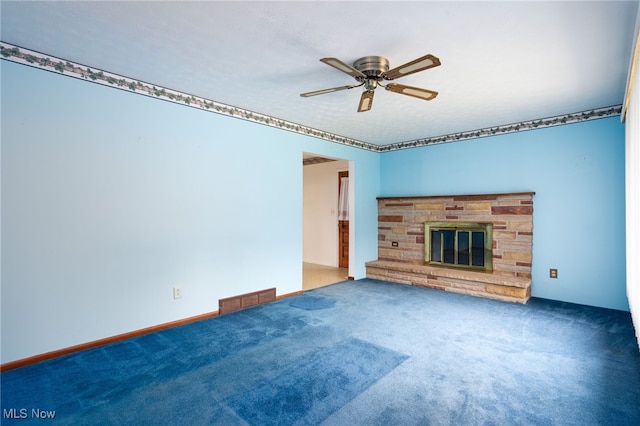 4855 Lake Dawn Dr, Medina, OH 44256 - unfurnished living room with ceiling fan, carpet floors, and a fireplace