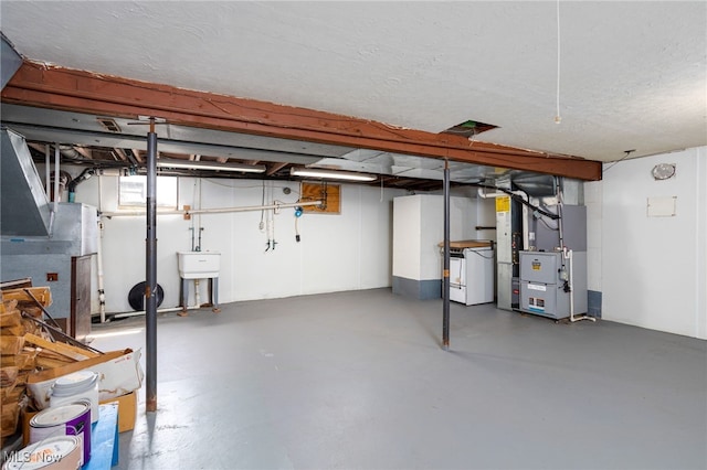 4855 Lake Dawn Dr, Medina, OH 44256 - unfinished basement featuring heating unit and a sink