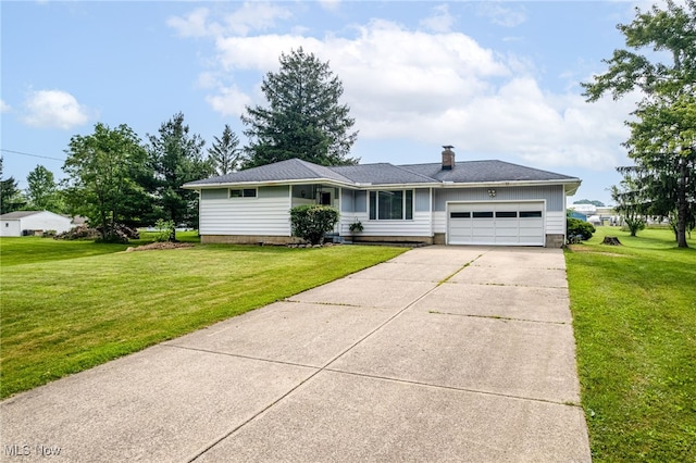 4855 Lake Dawn Dr, Medina, OH 44256 - view of front facade featuring a garage, driveway, and a front lawn