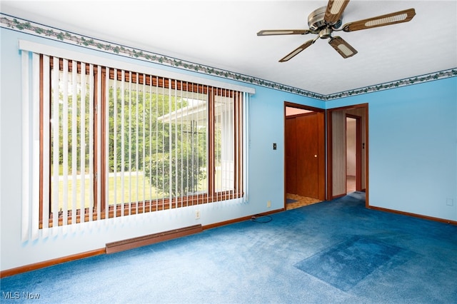4855 Lake Dawn Dr, Medina, OH 44256 - empty room with baseboard heating, baseboards, carpet floors, and ceiling fan
