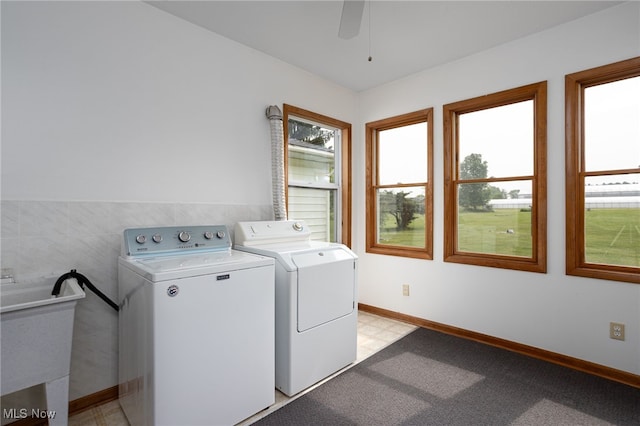4855 Lake Dawn Dr, Medina, OH 44256 - laundry room featuring washing machine and dryer, a ceiling fan, tile walls, and baseboards