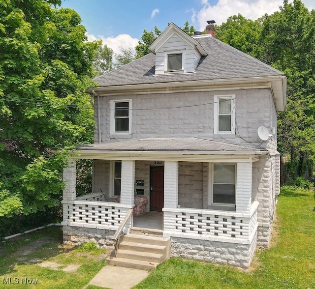 369 Cuyahoga St, Akron, OH 44310 - traditional style home with covered porch, a chimney, roof with shingles, and stone siding