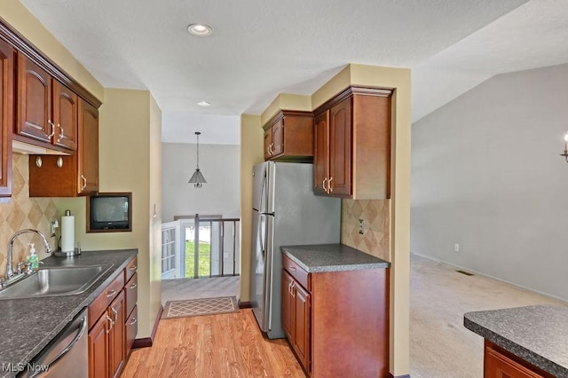 2610 Norton Rd, Stow, OH 44224 - kitchen with a sink, stainless steel appliances, dark countertops, baseboards, and recessed lighting