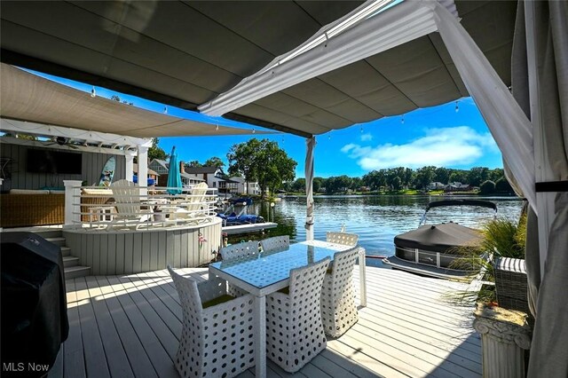 552 Saunders Ave, Akron, OH 44319 - wooden deck featuring a water view