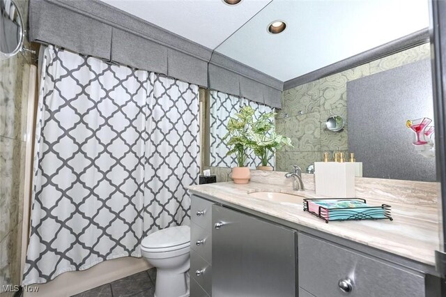 552 Saunders Ave, Akron, OH 44319 - full bath with vanity, tile patterned floors, and recessed lighting