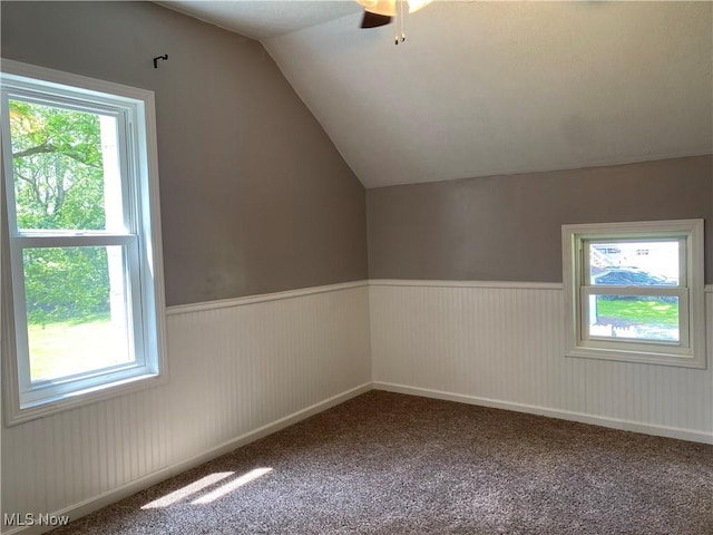 10919 Geib Ave NE, Hartville, OH 44632 - bonus room with wainscoting, vaulted ceiling, a ceiling fan, and carpet