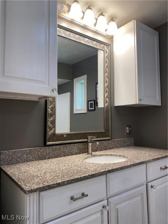 10919 Geib Ave NE, Hartville, OH 44632 - bathroom featuring vanity