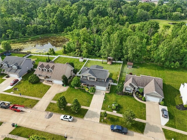 5380 Grovewood Ln, Medina, OH 44256 - aerial view of residential area featuring a heavily wooded area and a nearby body of water