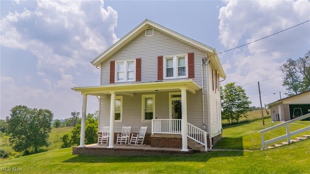 51300 Wegee Rd, Bellaire, OH 43906 - view of front of home with a porch and a front yard