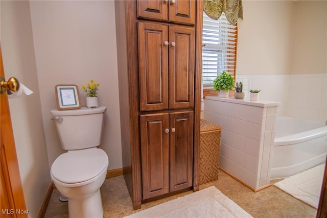 51300 Wegee Rd, Bellaire, OH 43906 - bathroom featuring toilet, a bath, and tile patterned floors
