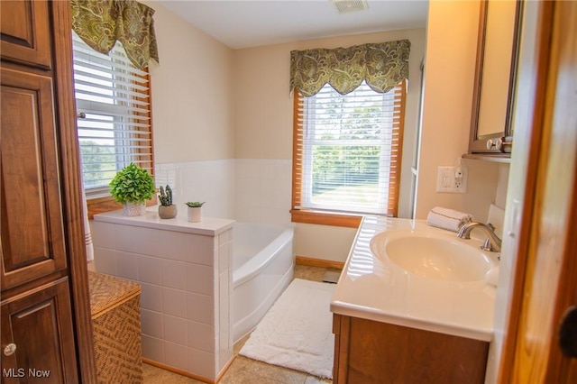 51300 Wegee Rd, Bellaire, OH 43906 - full bathroom featuring vanity and a bath
