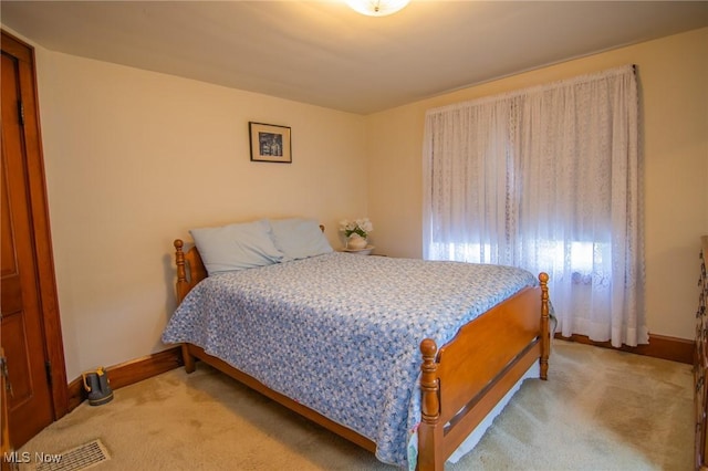 51300 Wegee Rd, Bellaire, OH 43906 - bedroom featuring light colored carpet and baseboards