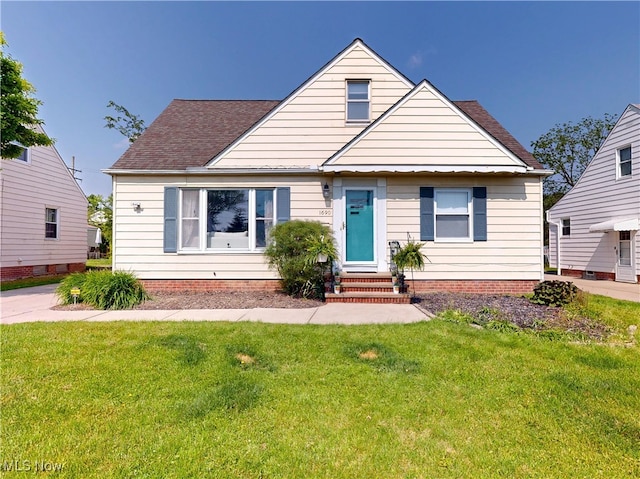 1690 Byron Dr, Mayfield Heights, OH 44124 - bungalow-style house with entry steps, a front lawn, and roof with shingles