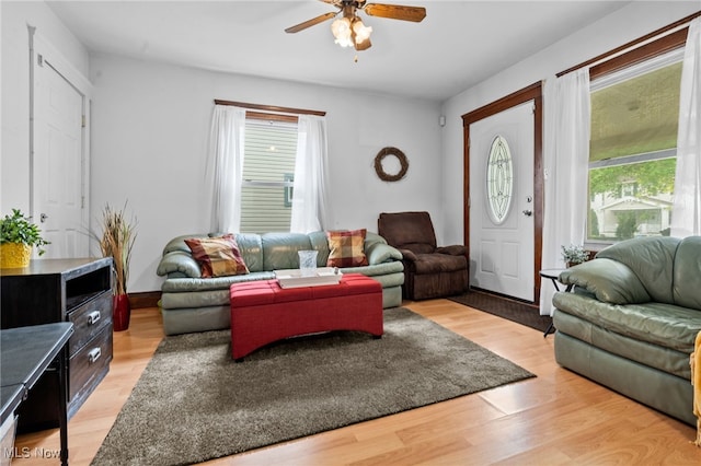 14520 Bayes Ave, Lakewood, OH 44107 - living room with a ceiling fan and light wood finished floors
