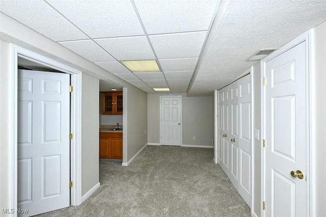 452 Herbert Rd, Akron, OH 44312 - hall with light carpet, baseboards, and a sink