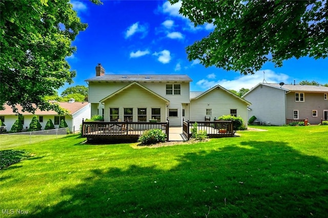 452 Herbert Rd, Akron, OH 44312 - rear view of property featuring a deck and a chimney