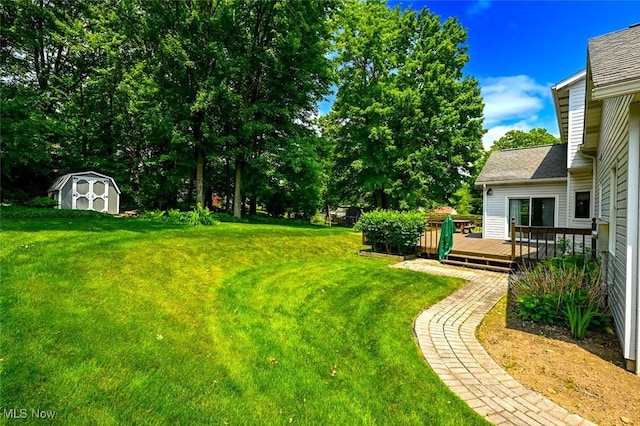 452 Herbert Rd, Akron, OH 44312 - view of green lawn with a wooden deck
