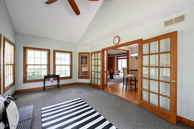 452 Herbert Rd, Akron, OH 44312 - unfurnished sunroom with french doors, vaulted ceiling, and a chandelier