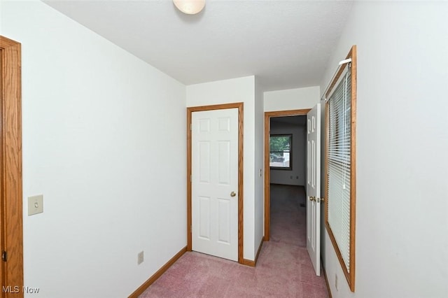 452 Herbert Rd, Akron, OH 44312 - unfurnished bedroom with light carpet, a closet, and baseboards