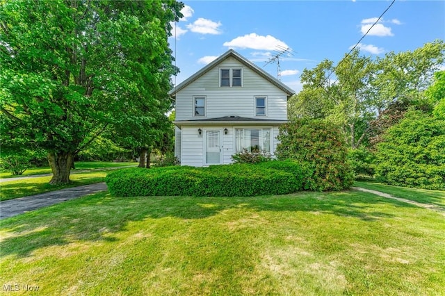 1372 W State St, Salem, OH 44460 - view of property exterior with a lawn