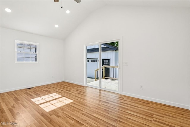 178 Lindsey Rd, Munroe Falls, OH 44262 - empty room featuring light wood-type flooring, a ceiling fan, recessed lighting, baseboards, and high vaulted ceiling